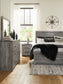 Bronyan King Panel Bed with Mirrored Dresser and 2 Nightstands